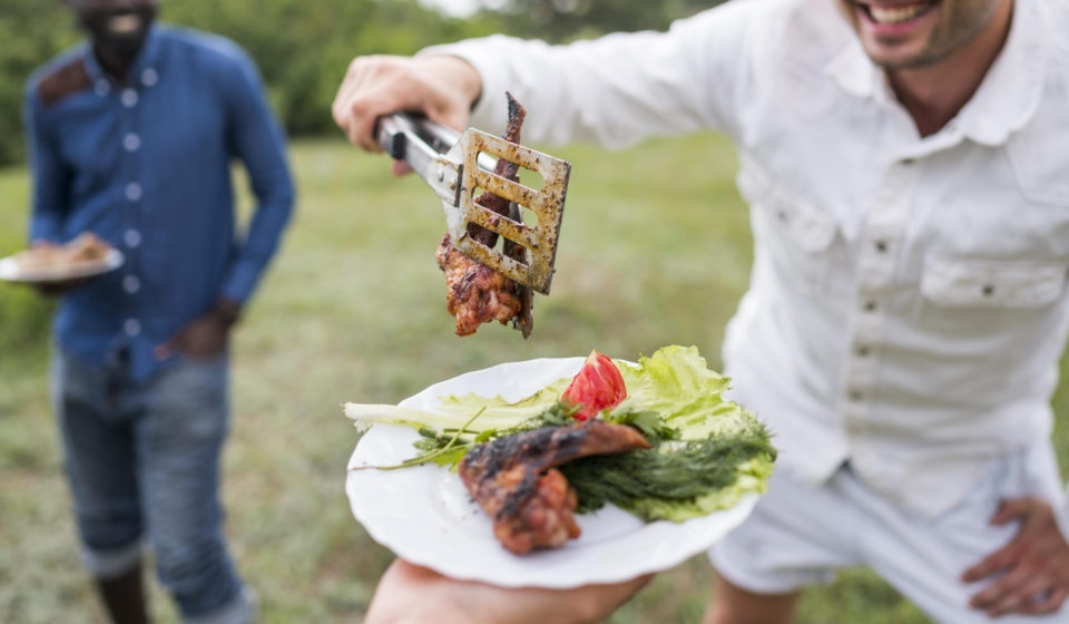 men-cooking-barbecue-outdoors
